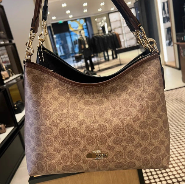 Koujia's new spring Laurel wandering bag with large capacity and high appearance is also a fashionable shoulder bag and a handheld women's bag